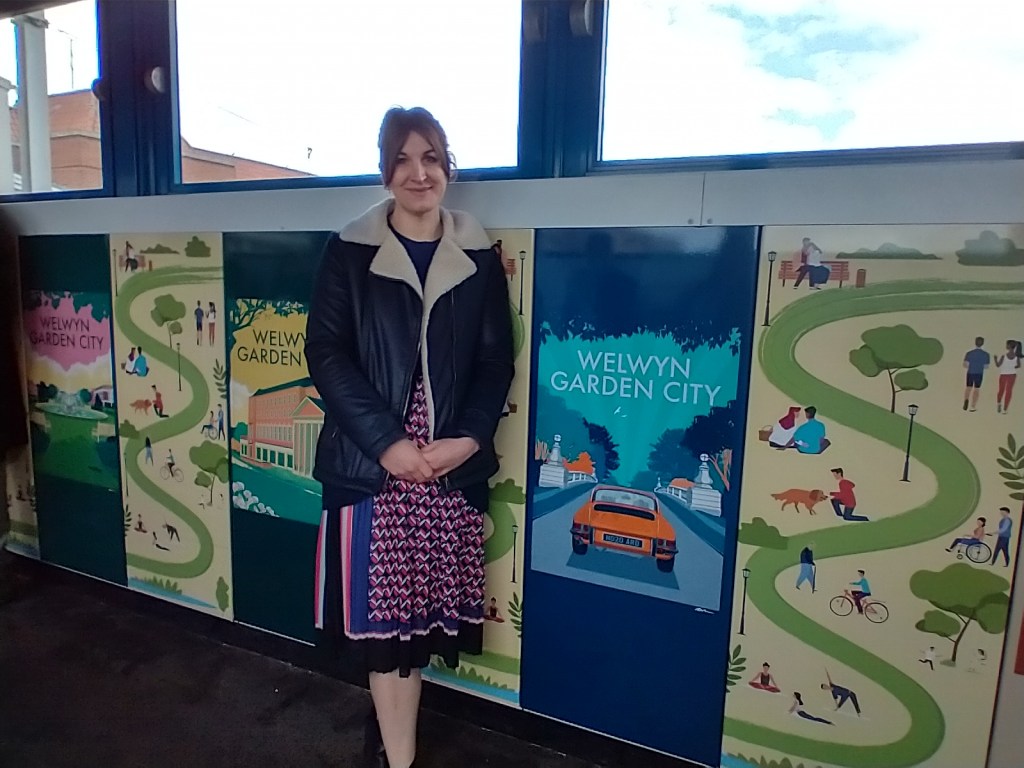 Katie Hounsome with her artwork.